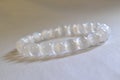 selenite bracelet , Selenite Bracelet White Round Beads Crystal Quartz Healing Stone. Royalty Free Stock Photo