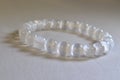 selenite bracelet , Selenite Bracelet White Round Beads Crystal Quartz Healing Stone. Royalty Free Stock Photo