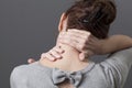 Self-acupressure for relaxing shoulder and backache Royalty Free Stock Photo