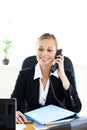 Self-assured businesswoman talking on phone