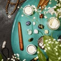 Rosary beads, aroma sticks, chakra stones, candles and flowers Royalty Free Stock Photo