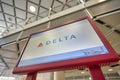 Delta sign seen at self-service check-in kiosk