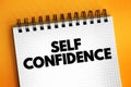 Self Confidence is an attitude about your skills and abilities, text concept on notepad Royalty Free Stock Photo