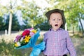 Self-conscious little boy singing