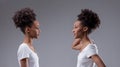 Self-critical black woman confronts own insecure reflection Royalty Free Stock Photo