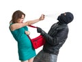 Self defense concept. Young woman is defending with pepper spray.