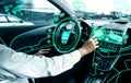 Self-drive autonomous car with man at driver seat Royalty Free Stock Photo