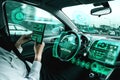 Self-drive autonomous car with man at driver seat Royalty Free Stock Photo