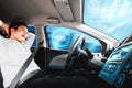 Self-drive autonomous car with man at driver seat. Royalty Free Stock Photo
