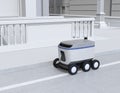 Self-driving delivery robot moving on the street Royalty Free Stock Photo