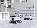 Self-driving delivery robots moving on the street Royalty Free Stock Photo