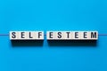 Self-esteem word concept on cubes Royalty Free Stock Photo