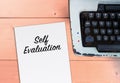 Self evaluation on paper with typewriter Royalty Free Stock Photo