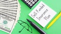 Self-Funded Insurance Plan is shown using the text and photo of dollars Royalty Free Stock Photo