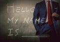 Self Introduction - Hello, My name is ... written on a blackboard with businessman Royalty Free Stock Photo