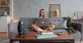 Self isolation concept, portrait of beautiful happy young blonde business woman using laptop to work online from home Royalty Free Stock Photo