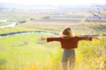 Self isolation during the quarantine time. Think about life. Beautiful girl enjoying nature view. Hipster on the hill. River and Royalty Free Stock Photo