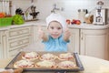 Little kid boy helps mother to cook pizza. Happy family mom and child in weekend morning at home. Relationship Royalty Free Stock Photo