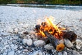 Self-made campfire by the mountain river