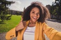 Self-portrait of attractive cheerful girl enjoying weather having fun showing thumbup visit new country tourism street Royalty Free Stock Photo