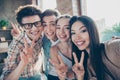 Self-portrait of four cheerful glad adorable people, handsome ne Royalty Free Stock Photo