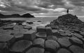 Self portrait in giants Causeway - Black and white