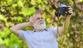 Self portrait. Memories in snap. Retro equipment for taking photo. Sharing his knowledge making good photo. Imitate Royalty Free Stock Photo