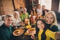 Self-portrait of nice attractive big full cheerful family small little kids meeting gathering eating domestic turkey