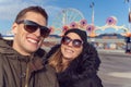 Couple taking a selfie in coney island. Luna park as background Royalty Free Stock Photo