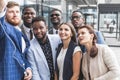 Self portrait of stylish successful, professional team, afro-american black man with stubble shooting selfie with hand Royalty Free Stock Photo