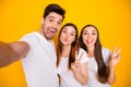 Self-portrait of three nice attractive lovely charming cheerful cheery positive person sending you kiss having fun Royalty Free Stock Photo