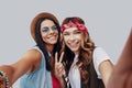 Self portrait of two attractive stylish young women Royalty Free Stock Photo