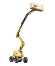 Self propelled articulated boom lift on a light background Royalty Free Stock Photo