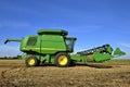 Self propelled combine in bean field Royalty Free Stock Photo
