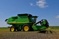 Self Propelled 9770 ST John Deere combine parked in wheat stubble Royalty Free Stock Photo