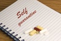Self quarantine message and colorful pills