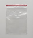 Self sealed packing bag on the grey background