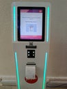 Self-Service Airport Kiosk Printing Boarding Pass in Modern Travel Setup
