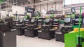 Self service area in modern Asda supermarket showing self-service pay point tills