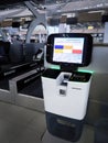 Self service machine at the airport, self check in, loading baggage, self bag drop Royalty Free Stock Photo