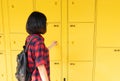 Self-service storage locker. Tourist uses the service of automated locker storage. Luggage and parcel delivery service. Package