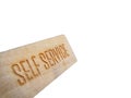 Self service text sign on wooden label
