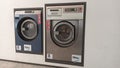 15.03.2023 Self-service washing machines in one of the laundries in Lisbon in Portugal