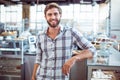 Selfassured waiter smiling Royalty Free Stock Photo