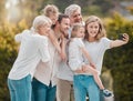 Selfie of big family in garden together with smile, grandparents and parents with kids in backyard. Photography Royalty Free Stock Photo