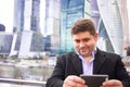 Selfie, businessmen taken pictures of her self on business centre background