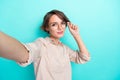 Selfie closeup photo of young confident cool business lady wear beige shirt hold her eyeglasses positive media