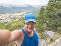 Selfie of cool trailrunning man in croatia on the island krk in baska in summer