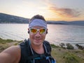 Selfie of cool trailrunning man in croatia on the island krk in baska in summer