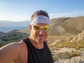 Selfie of cool trailrunning man in croatia on the island krk in baska in summer